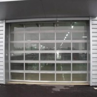 工業(yè)提升門廠家 滑升門廠家 天津科曼斯門業(yè)